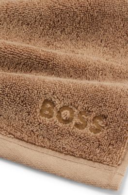 Aegean-cotton face cloth with tonal logo, Brown