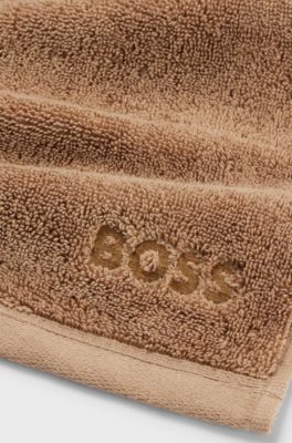 Aegean-cotton face cloth with tonal logo, Brown