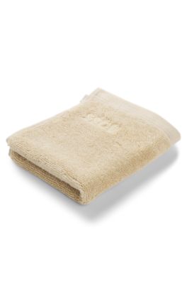 Aegean-cotton face cloth with tonal logo, Beige