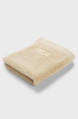 Aegean-cotton face cloth with tonal logo, Beige