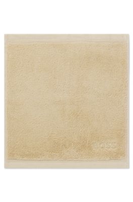 Aegean-cotton face cloth with tonal logo, Beige