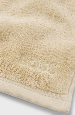 Gezichtsdoekje van Ege&iuml;sche katoen met ton-sur-ton logo, Beige