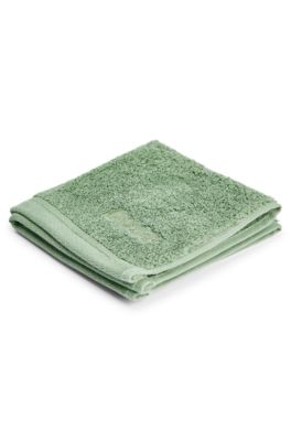 Aegean-cotton face cloth with tonal logo, Green