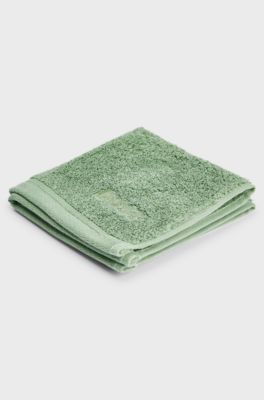 Waschlappen aus &auml;g&auml;ischer Baumwolle mit tonalem Logo, Gr&uuml;n