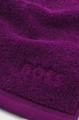 Aegean-cotton face cloth with tonal logo, Purple
