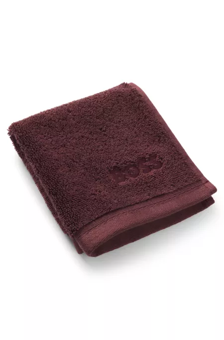 Aegean-cotton face cloth with tonal logo