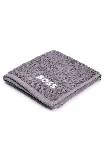 Cotton face cloth with white logo embroidery