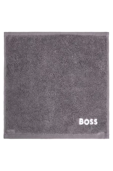 Cotton face cloth with white logo embroidery