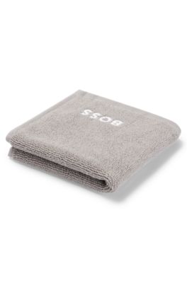 Cotton face cloth with white logo embroidery, Grey