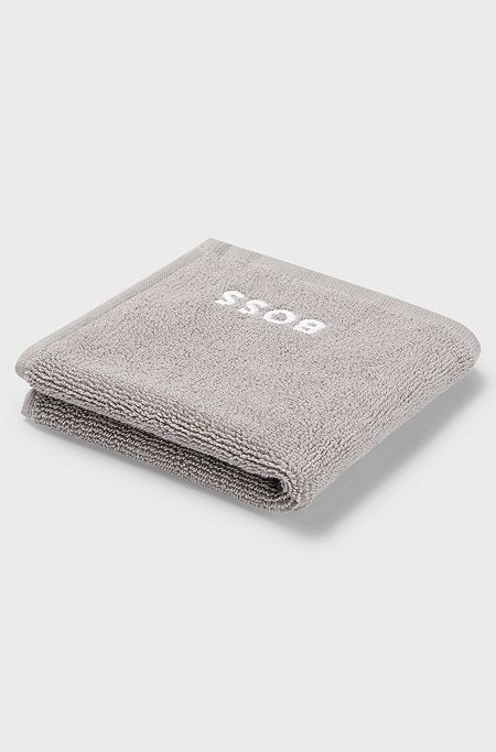 Cotton face cloth with white logo embroidery, Grey