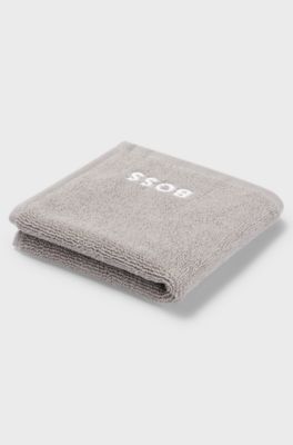 Cotton face cloth with white logo embroidery, Grey