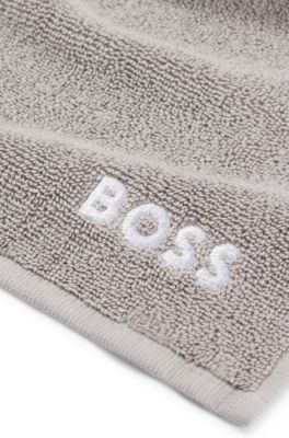 Cotton face cloth with white logo embroidery, Grey