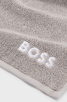 Cotton face cloth with white logo embroidery, Grey