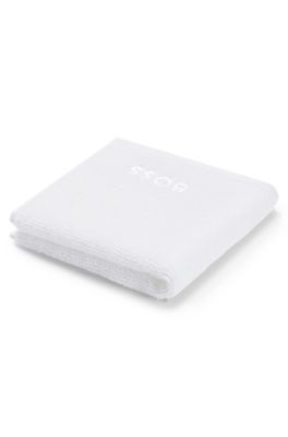 Cotton face cloth with white logo embroidery, White