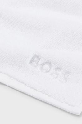 Cotton face cloth with white logo embroidery, White