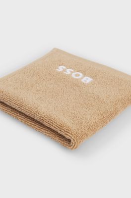 Cotton face cloth with white logo embroidery, Beige