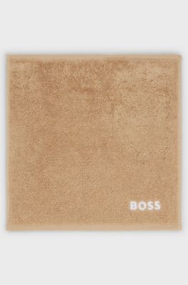 Cotton face cloth with white logo embroidery, Beige