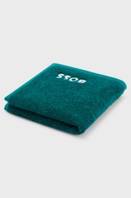 Asciugamano per il viso in cotone con logo bianco ricamato, Verde scuro