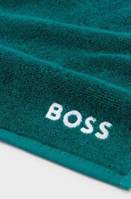 Serviette de toilette en coton avec logo brod&eacute; blanc, Vert sombre
