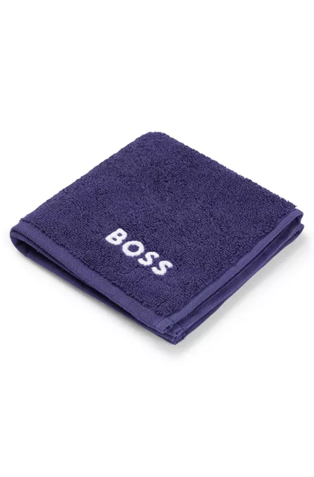 Cotton face cloth with white logo embroidery