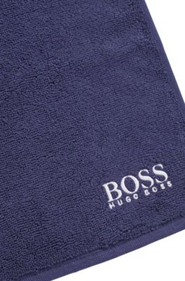 Cotton face cloth with white logo embroidery, Dark Blue