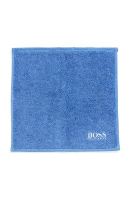 Cotton face cloth with white logo embroidery, Blue