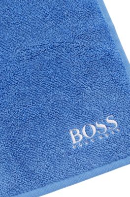 Cotton face cloth with white logo embroidery, Blue