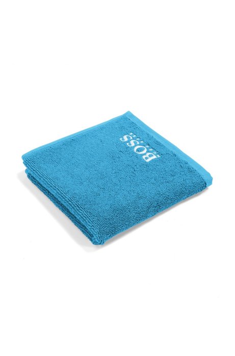 Finest Egyptian cotton face cloth with logo embroidery, Blue