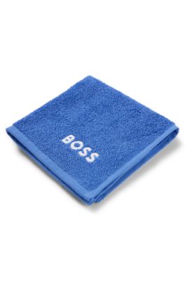 Cotton face cloth with white logo embroidery, Blue