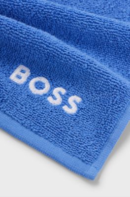 Cotton face cloth with white logo embroidery, Blue