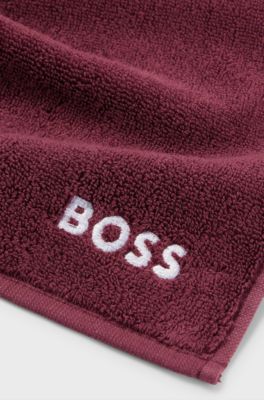 Cotton face cloth with white logo embroidery, Dark Purple