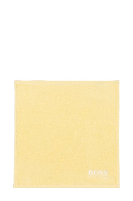 Finest Egyptian cotton face cloth with logo embroidery, Light Yellow