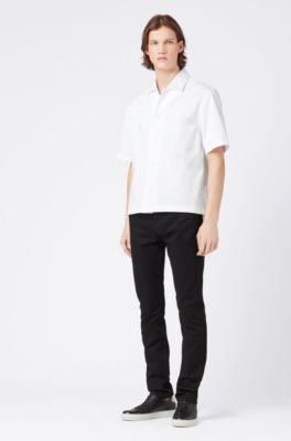 black jeans and polo shirt