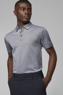 blue polo shirt and black pants
