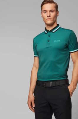 blue polo shirt and black pants