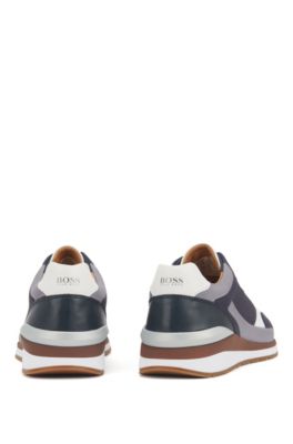 Running-inspired trainers in leather with monogram panels, Open Blue