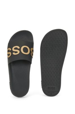 black and gold hugo boss sliders