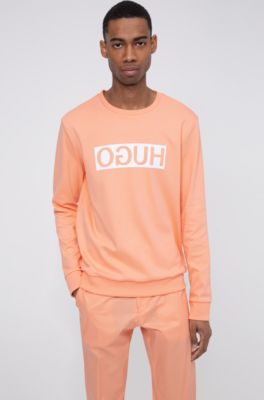 light orange sweatshirt