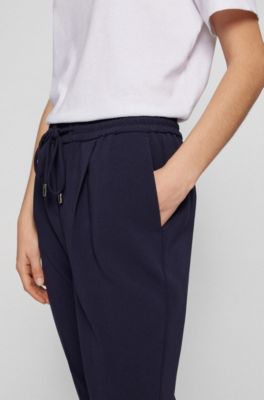 Pantalones regular fit con cord&oacute;n en crep&eacute; japon&eacute;s resistente a las arrugas, Azul oscuro