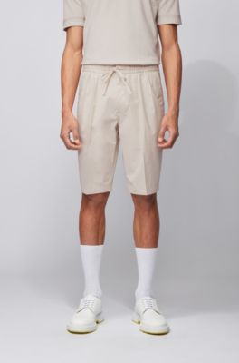 Relaxed-fit shorts in paper-touch 