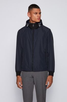 Hugo Boss Blouson-style jacket in laminated fabric with detachable hood. 2