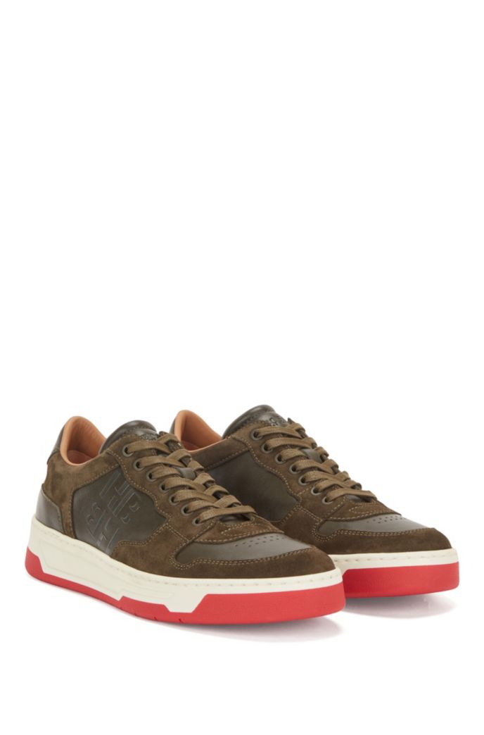 cosmo studded leather and logo trainer