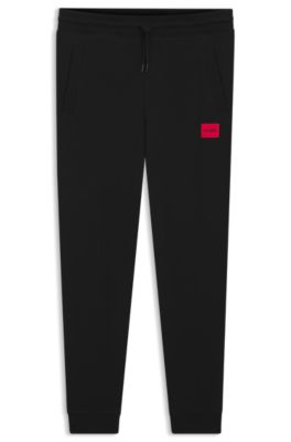 Logo-label tracksuit bottoms in cotton terry, Black