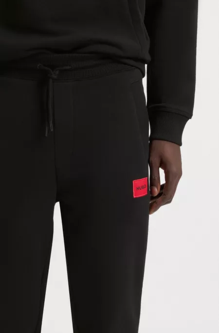Logo-label tracksuit bottoms in cotton terry