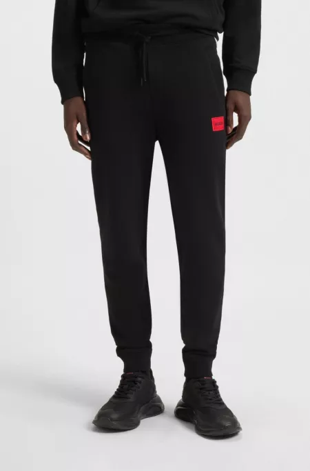 Logo-label tracksuit bottoms in cotton terry