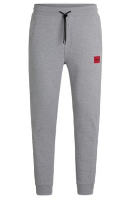 Hugo Cotton-terry Tracksuit Bottoms With Red Logo Label In Dark Grey