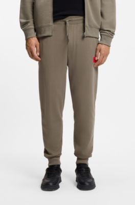 Logo-label tracksuit bottoms in cotton terry, Brown