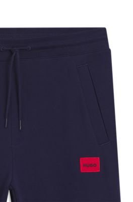 Logo-label tracksuit bottoms in cotton terry, Dark Blue