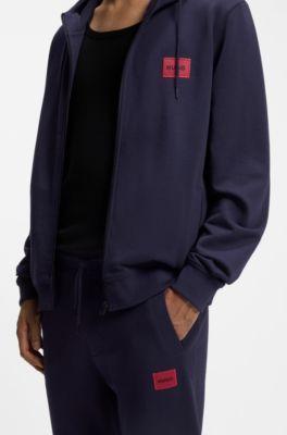 Pantalones de ch&aacute;ndal en felpa de algod&oacute;n con etiqueta con logo roja, Azul oscuro