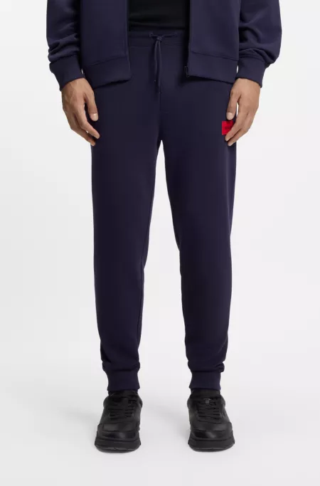 Logo-label tracksuit bottoms in cotton terry